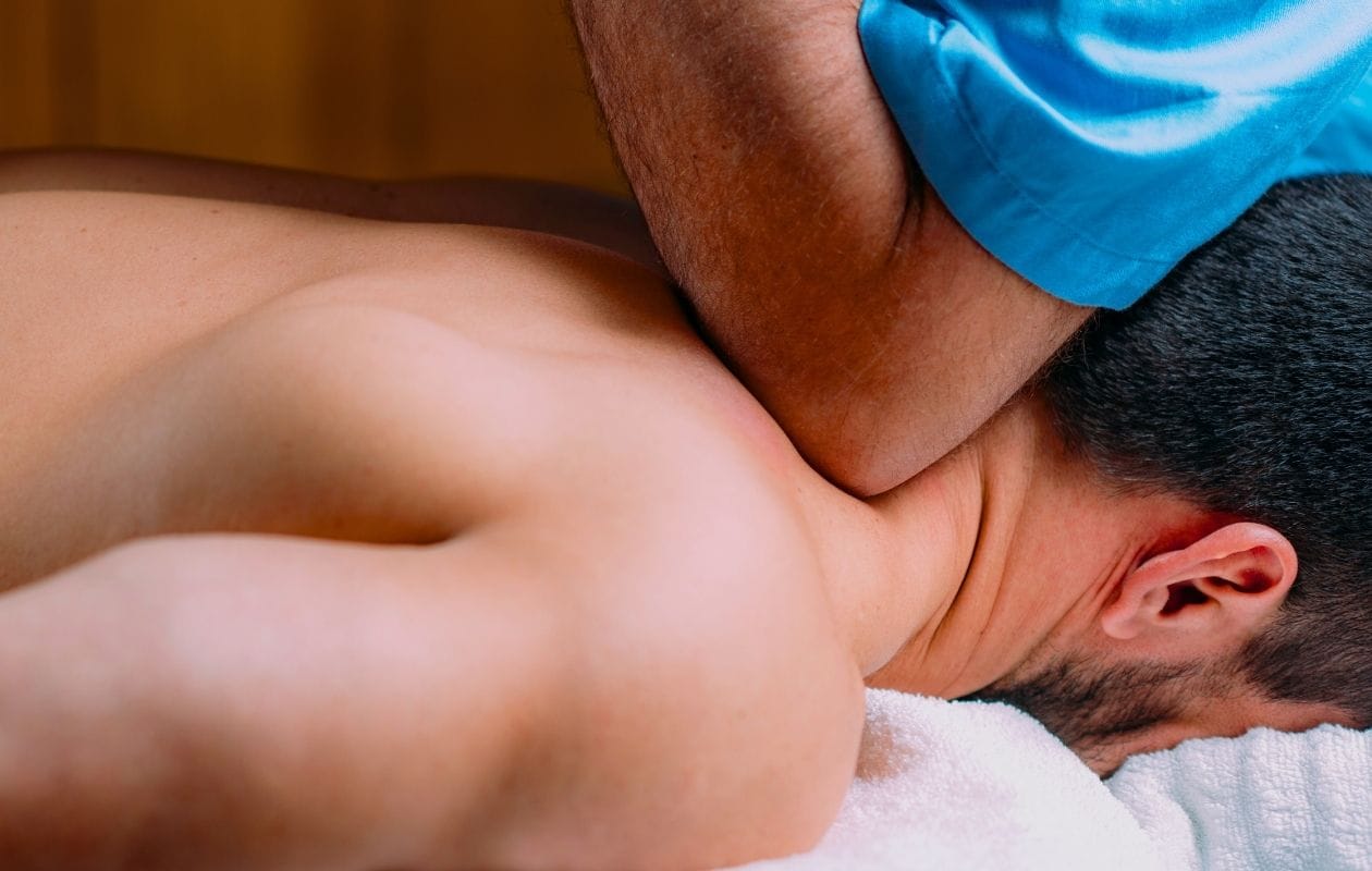 A male receiving a sports massage