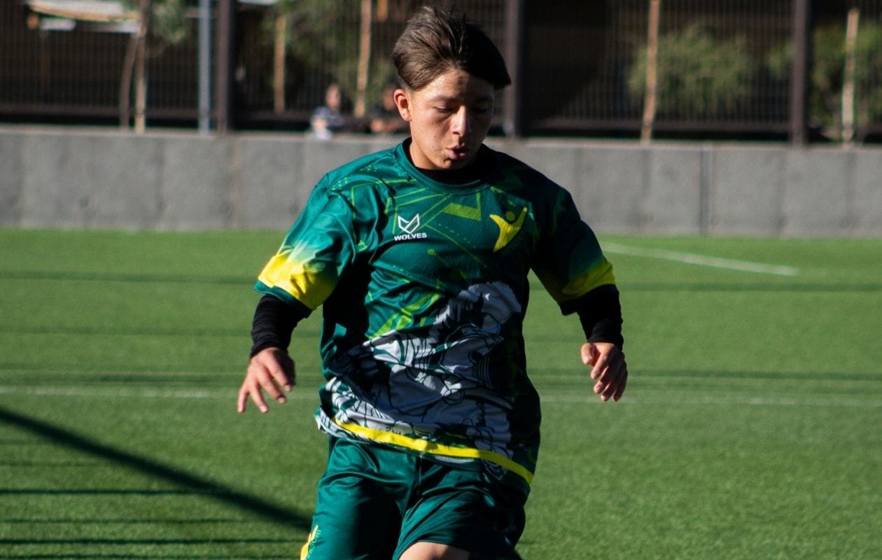 A male playing football