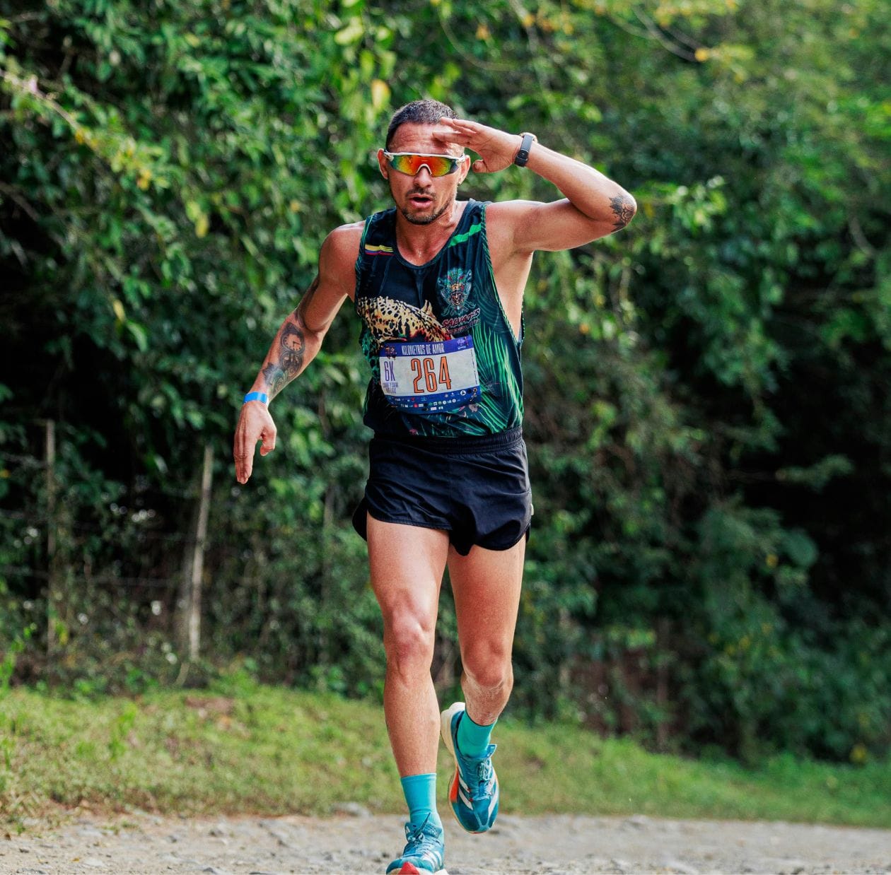 Male runner competing in a 6K trail race, returning to performance after running injury rehabilitation